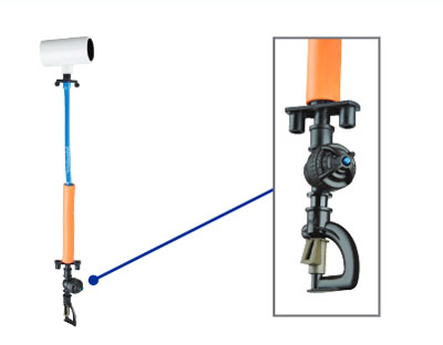 Sprinkler drop assemblies operate under low-pressure and produce large water droplets that stimulate poultry to stand and release trapped heat underneath their bodies.